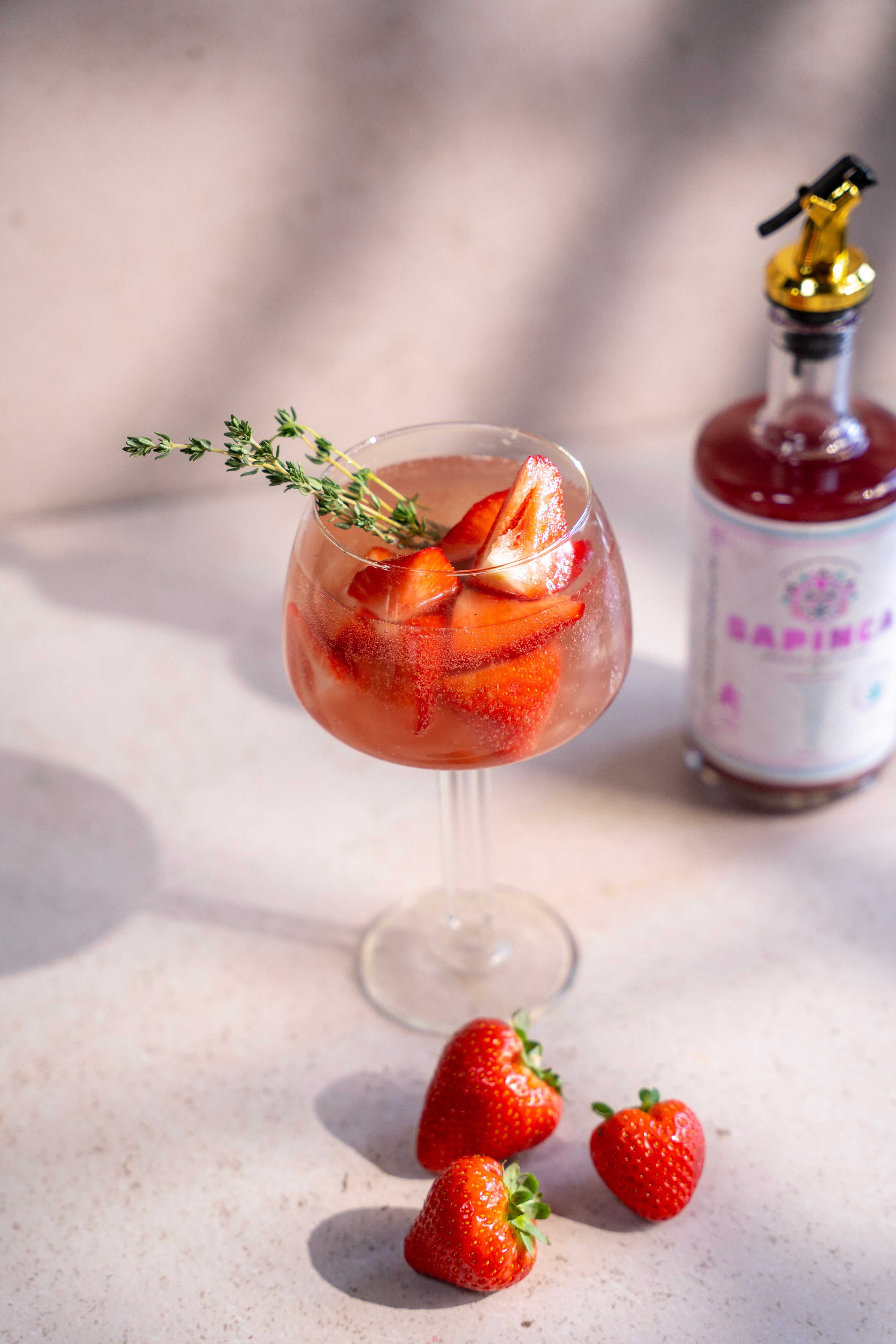 STRAWBERRY THYME SPRITZ