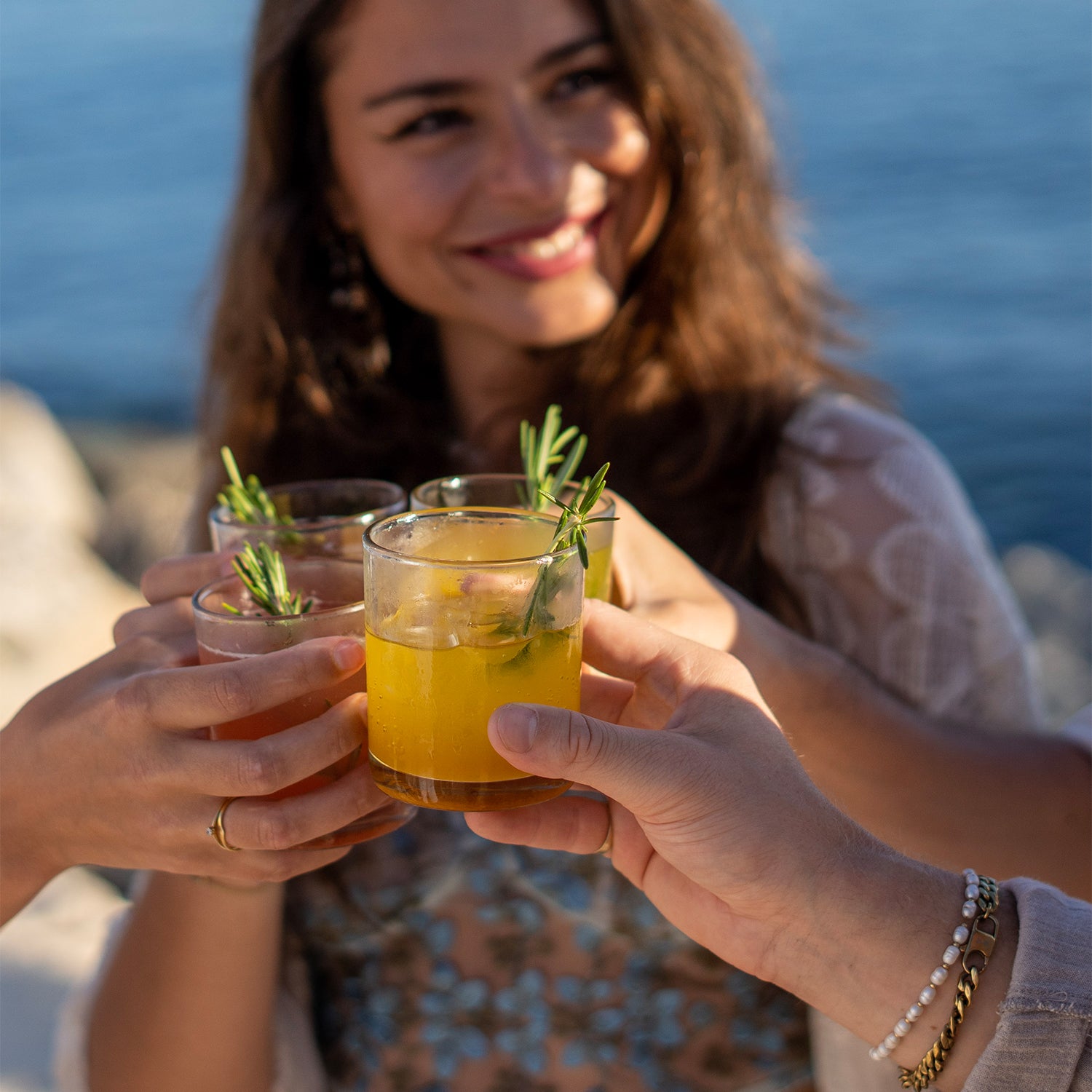 Friends sharing drinks Organic Root Fruit Elixir - Natural Alcohol Free mocktail